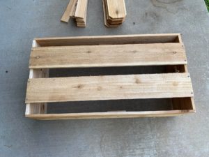 Planter box with support rails for base